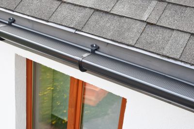 Gutter Cover System with Debris Blockage